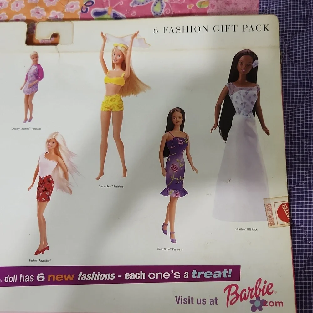 Brand New never opened Barbie fashions.